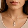 21493 Silver pendant with zircons TWO HEARTS
