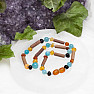 Amber beads for children satin multicolor with aquamarine and hazelnut wood