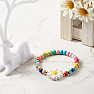 Children's bracelet made of wooden beads Kopretina