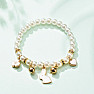 Children's bracelet made of white acrylic beads Bunny