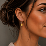 Silver dangling earrings with citrine