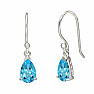 Silver dangle earrings with blue topaz