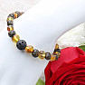 Green amber bracelet with a lava bead