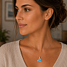 Silver pendant with blue topaz Flower trio