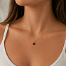 Silver pendant with garnet