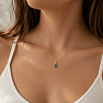 Silver pendant with mystical topaz