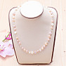 Luxurious pearl necklace made of multicolored pearls and beads in Swarovski style