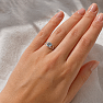 Silver ring with blue topaz