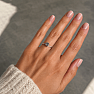 Silver ring with mystical topaz