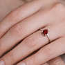 Silver ring with garnet