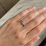 Silver ring with blue topaz