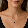 Silver pendant with garnet